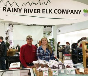 Willian Darby and his daughter at the Rainy River Elk booth